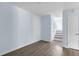 Well-lit living room shows neutral walls and updated, modern flooring at 1139 Mainstreet Valley Dr, Stone Mountain, GA 30088