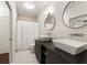 Modern bathroom featuring dual vanity sinks and stylish fixtures at 1300 Dekalb Ne Ave # 221, Atlanta, GA 30307