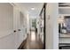 Hallway with storage closets and access to bedroom and other areas of the home at 1300 Dekalb Ne Ave # 221, Atlanta, GA 30307