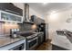 Contemporary kitchen with stainless steel appliances and sleek cabinetry at 1300 Dekalb Ne Ave # 221, Atlanta, GA 30307