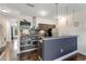 Contemporary kitchen featuring stainless steel appliances and a breakfast bar area at 1300 Dekalb Ne Ave # 221, Atlanta, GA 30307