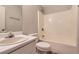 Cozy bathroom features a tub shower and vanity at 275 Mountain Way, Covington, GA 30016