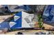 An aerial shot reveals a patterned roof and well-defined property lines, showcasing its location in a leafy neighborhood at 3355 Olivia Ct, Cumming, GA 30041