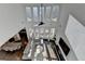 Open-concept living room boasting high ceilings, a wall of windows, and modern furnishings at 3355 Olivia Ct, Cumming, GA 30041
