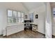 Cozy office space with custom built-ins, plantation shutters, and hardwood floors at 3355 Olivia Ct, Cumming, GA 30041