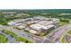 Beautiful aerial view of a community with retail and residential buildings near busy roads with heavy traffic at 6370 Cortland Walk, Alpharetta, GA 30005