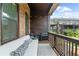 Relaxing balcony with a seating area and scenic views of the community at 6370 Cortland Walk, Alpharetta, GA 30005