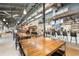 Well-lit restaurant interior with an open bar and a modern industrial design at 6370 Cortland Walk, Alpharetta, GA 30005