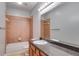 Updated bathroom with a shower-tub combination and modern countertop at 7712 Autry Cir # 701, Douglasville, GA 30134