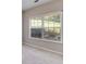 Neutral bedroom with a carpeted floor and large windows offering outdoor views at 7712 Autry Cir # 701, Douglasville, GA 30134
