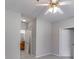 Bedroom featuring neutral paint, carpeted floors, and access to the en-suite bathroom at 7712 Autry Cir # 701, Douglasville, GA 30134