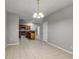 Open floor plan combining the dining area with a glimpse of the kitchen and its appliances at 7712 Autry Cir # 701, Douglasville, GA 30134