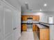 Spacious kitchen featuring updated appliances, a breakfast bar, and ample cabinet space for storage at 7712 Autry Cir # 701, Douglasville, GA 30134