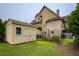 Backyard with a storage shed and garden area, showcasing a serene outdoor living space and landscaping at 2675 Portabella Ln, Cumming, GA 30041