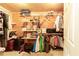 Spacious walk-in closet with extensive shelving and wooden plank back at 2675 Portabella Ln, Cumming, GA 30041