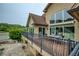 Expansive decks offer multiple views of the lake, outdoor kitchen, and pool at 2675 Portabella Ln, Cumming, GA 30041