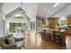 Bright kitchen and dining area featuring hardwood floors, ample natural light, and access to a deck at 2675 Portabella Ln, Cumming, GA 30041