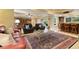 Finished basement featuring bar, lounge seating, and an area rug at 2675 Portabella Ln, Cumming, GA 30041