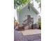 Back exterior view showing a deck with stairs, patio, green siding and mature trees at 151 Savannah Se St, Atlanta, GA 30316