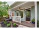 Charming front porch with stylish decor, offering a cozy outdoor space at 151 Savannah Se St, Atlanta, GA 30316