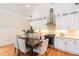 Modern kitchen with stainless steel appliances and a dining area at 151 Savannah Se St, Atlanta, GA 30316
