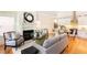 Open-concept living space featuring a fireplace and seamless flow to the modern kitchen at 151 Savannah Se St, Atlanta, GA 30316