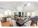 Open-concept living area featuring stainless appliances, vaulted ceilings, modern decor, and hardwood floors at 151 Savannah Se St, Atlanta, GA 30316