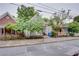 Cozy home on tree-lined street featuring a welcoming front porch and well-maintained yard at 151 Savannah Se St, Atlanta, GA 30316