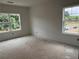 Spacious bedroom boasts two windows, offering scenic outdoor views at 3108 Marbella Cir # 4, Kennesaw, GA 30152