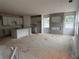 Spacious living area with kitchen, fireplace, and multiple windows offering plenty of natural light at 3108 Marbella Cir # 4, Kennesaw, GA 30152