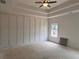 Main bedroom featuring trey ceiling, custom wall trim, and recessed lighting at 3108 Marbella Cir # 4, Kennesaw, GA 30152