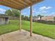 View of backyard with green grass, patio and wooden fence at 3430 Grand Manor Trl, Snellville, GA 30039
