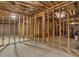 Unfinished basement with visible framing and insulation offers potential for customization at 3430 Grand Manor Trl, Snellville, GA 30039