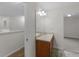 Bathroom vanity with sink and mirror, offering ample lighting and neutral decor at 3430 Grand Manor Trl, Snellville, GA 30039