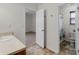 Bathroom view featuring a vanity, access to a bedroom and a separate toilet and shower room at 3430 Grand Manor Trl, Snellville, GA 30039