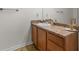 Bathroom features vanity with granite countertop, storage, and an elegant faucet at 3430 Grand Manor Trl, Snellville, GA 30039