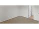 Bedroom featuring neutral carpet, white walls and trim, and a doorway at 3430 Grand Manor Trl, Snellville, GA 30039
