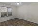 Bedroom with neutral walls, ceiling fan, and natural light from the window at 3430 Grand Manor Trl, Snellville, GA 30039