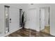 Inviting entryway features wood-look floors, a coat rack, and neutral paint at 3430 Grand Manor Trl, Snellville, GA 30039