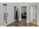 Inviting entryway features wood-look floors, a coat rack, and neutral paint at 3430 Grand Manor Trl, Snellville, GA 30039