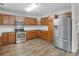 Spacious kitchen with stainless steel appliances and lots of cabinet space at 3430 Grand Manor Trl, Snellville, GA 30039