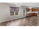 Bright kitchen with stainless steel appliances, window, and wooden cabinets at 3430 Grand Manor Trl, Snellville, GA 30039