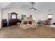 Spacious main bedroom with vaulted ceiling, carpet, and fan at 3430 Grand Manor Trl, Snellville, GA 30039
