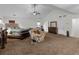 Large main bedroom boasts a ceiling fan and lots of natural light at 3430 Grand Manor Trl, Snellville, GA 30039