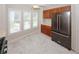 Well-lit kitchen with stainless steel appliances, ample cabinets, and a window view, creating a functional cooking space at 3697 E Bay St, Duluth, GA 30096