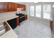 Bright kitchen featuring stainless steel appliances, sleek countertops, and ample cabinet space, perfect for culinary enthusiasts at 3697 E Bay St, Duluth, GA 30096