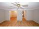 Open concept living room with crown molding and easy access to other rooms at 3697 E Bay St, Duluth, GA 30096