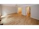 Bright living room with updated floors, neutral paint, and an open layout at 3697 E Bay St, Duluth, GA 30096
