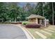 Pool house surrounded by lush landscaping at 3697 E Bay St, Duluth, GA 30096