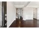 Inviting foyer with hardwood floors and view of the staircase at 4090 Danbury Farms Dr, Cumming, GA 30040